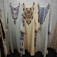 Fournisseur en gros pour boutiques : Ensemble deux pièces en tricot pour femme, veste à col rond et manches longues et jupe assortie, tenue chic et modeste pour femme musulmane