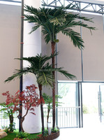 Feuilles de faux palmier tropicales réalistes grands cocotiers incurvés artificiels à vendre pour le centre commercial d'hôtel