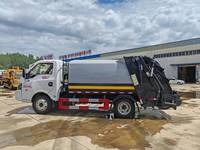 Camion à ordures diesel manuel Dongfeng 5000L avec compacteur hydraulique et fonction de recyclage pour le transport des déchets urbains