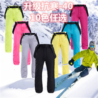 Pantalons de ski pour adultes de style nouveau, hommes et femmes - Snowboard, ski alpin, épaissis, coupe-vent, chauds, bretelles amovibles, 100% polyester