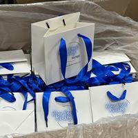 Sacs de transport et de shopping de luxe bleu clair de petite taille avec impression de votre logo personnalisé pour boutiques de parfums/bijoux