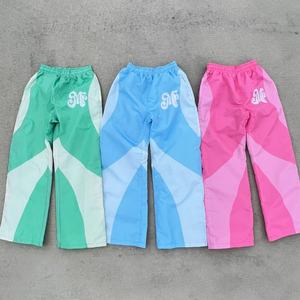 Nouveau pantalon cargo homme personnalisé de haute qualité, léger, avec logo imprimé DTG, réfléchissant, en nylon, patchwork, taille élastique oversize, style survêtement - Product Image 1