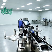 Machine de marquage laser UV, machine de codage automatique intégrée avec fonction d'étiquetage horizontal pour les flacons de cosmétiques à usage quotidien