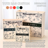 Sac en papier mat blanc avec logo personnalisé imprimé à l'écran et ruban nœud papillon pour magasin de vêtements, emballage cadeau commercial