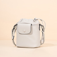 Nouveau sac hobo en cuir véritable, style sac seau à cordon, sac à bandoulière polyvalent pour femmes, pour un usage quotidien