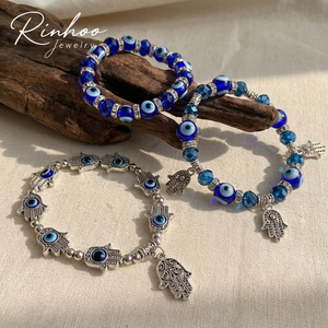 RINHOO Braccialetto Trendy Turco con Amuleto Occhio di Allah Blu, Bracciali con Perline in Resina e Cristallo Mano di Fatima, Gioielli Portafortuna per Donna e Uomo - Product Image 1