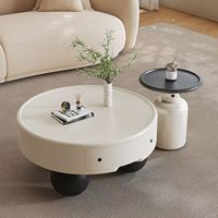Table basse de style crème pour un salon minimaliste, petit appartement, table basse ronde moderne, simple et haut de gamme