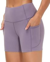 Dragon Fit Short de yoga taille haute pour femmes avec 2 poches latérales Tissu tricoté respirant Contrôle du ventre pour la course et l'entraînement à la maison