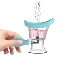 Gobelet de lavage oculaire en silicone en gros avec support, réservoir de nettoyage à pression d'air, bouteille de rinçage pour les soins des yeux