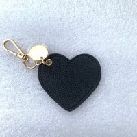 Porte-clés en forme de cœur fait main, pendentif en forme de cœur, chaîne de suspension pour clés de voiture, cadeau, mini breloque de sac en cuir personnalisée