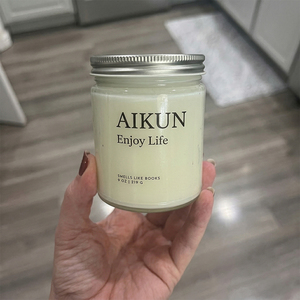 AIKUN Portable Eco Friendly Frosted Glass Jar Soy Wax Custom Scented <b>Candle</b> Home Fragrance <b>Candle</b> for Spa Use - Product Image 1