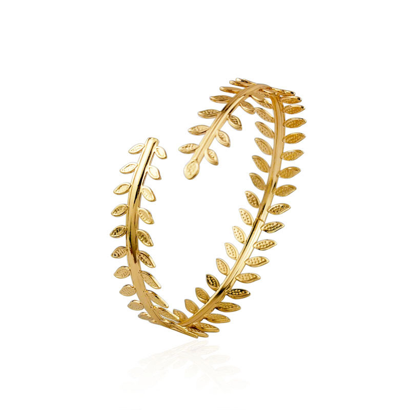 Bague bras doré petite feuille