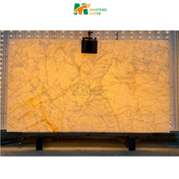 Dalle de marbre blanc de l'âge glacial naturel, marbre onyx blanc, mur rétroéclairé, table à manger photoélectrique, îlot de cuisine, crédence
