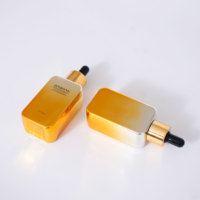 Vente en gros de flacons compte-gouttes en verre doré carrés de 50 ml, pour emballages cosmétiques, sérum, lotion, huile
