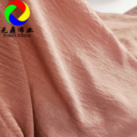 Vente en gros Kain Grosir 100% polyester soyeux Santorini tache daim velours tissu pour musulman Abaya robe Hijab écharpe et vêtements