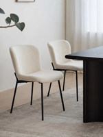 Chaise de salle à manger moderne minimaliste avec structure en acier et revêtement en lin, design haut de gamme durable pour salles à manger