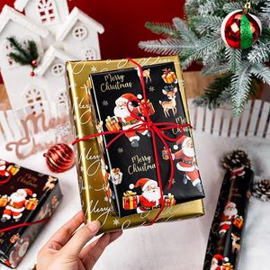 Papier cadeau de Noël noir et or, double face, motif mignon Père Noël et rennes - Product Image 2