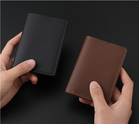 Dompet kecil kulit PU harga pabrik untuk pria dompet Premium dengan kancing tas kartu kredit Ultra tipis dompet koin satu dolar
