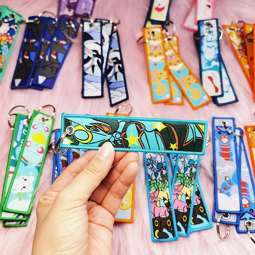 Stock Cartoon keychain Fabric Keychain Woven key chain luggage tag Anime Embroidery Keychain Embroidered Jet Tag Key Tag