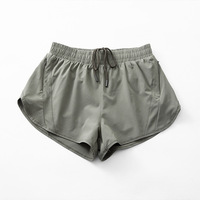 Shorts de sport athlétiques pour femmes avec poche pour téléphone, contrôle du ventre intégré, taille haute, sans manches, en polyester, pour la course, le yoga et la gym