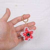 Porte-clés fleur fait main en gros, crocheté en fil, pendentif fleur de cerisier rouge, accessoire créatif, décoration à suspendre pour sac