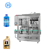 Ligne de production de liquide à suivi automatique submergée à 4 têtes, machine de remplissage et de bouchage d'huile lubrifiante