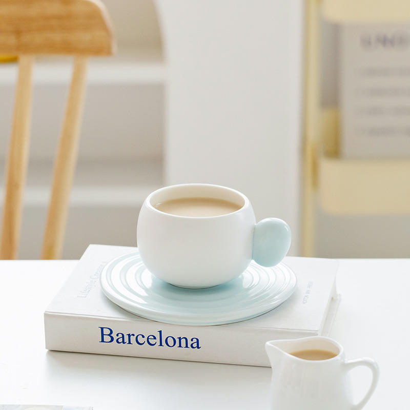 Matte blue milk ring coffee cup and saucer