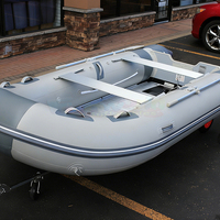 Bateau de pêche gonflable en PVC Zodiac, prix des bateaux en caoutchouc, Schlauchboot, bateau gonflable à moteur avec roue de lancement sur tableau arrière