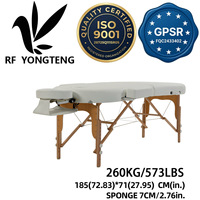 Table de massage pliante ovale en bois de hêtre à 2 sections, réglable en hauteur, avec repose-tête et accoudoirs pour la physiothérapie, les salons de beauté et les spas