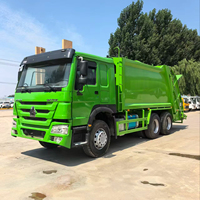 Camion à ordures à chargement arrière HOWO 18CBM 20CBM, camion à compression hydraulique pour le nettoyage urbain