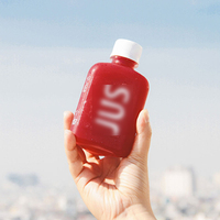 Bouteilles de boisson en plastique portables de qualité alimentaire, personnalisées avec un logo minimaliste, pour les boutiques de jus pressés à froid