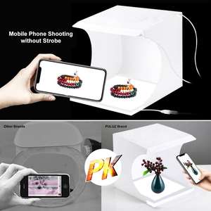 Prix d'usine PULUZ 20cm avec 1 panneau LED, mini <span class=keywords><strong>studio</strong></span> photo <span class=keywords><strong>pliable</strong></span>, <span class=keywords><strong>fond</strong></span> <span class=keywords><strong>noir</strong></span> <span class=keywords><strong>et</strong></span> <span class=keywords><strong>blanc</strong></span>, kit de <span class=keywords><strong>studio</strong></span> photo avec lumière 1100LM - Product Image 4