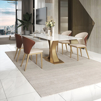 Table à manger rectangulaire en marbre et pierre frittée, design créatif haut de gamme, style moderne et luxueux.