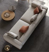 Canapé modulaire sectionnel de luxe léger, style villa italienne moderne, en tissu minimaliste, avec coussins rembourrés en éponge et garnissage en plumes
