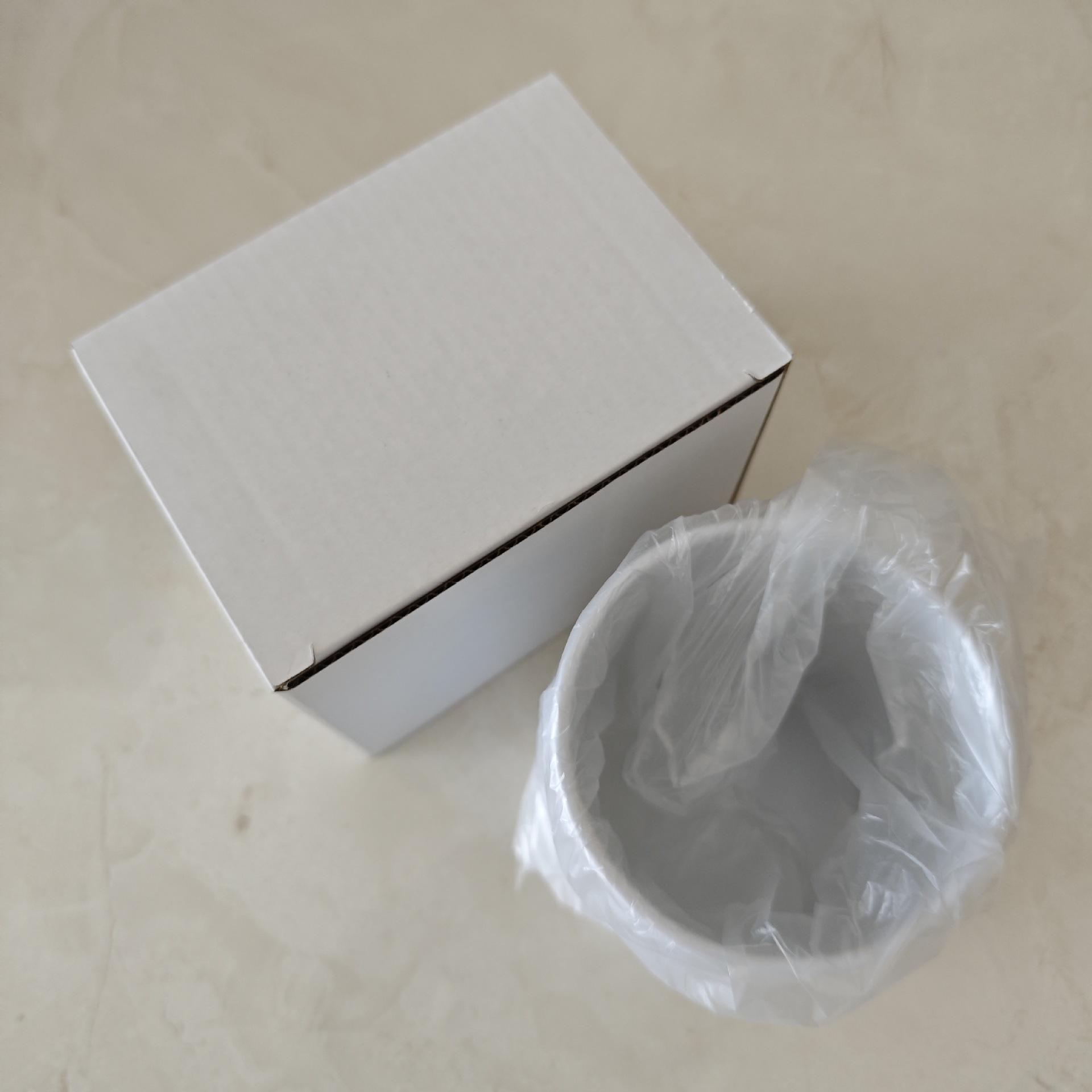 White cup with custom pattern, white box