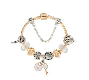 Pulsera de dijes chapada en oro con corazón, llave y corona para mujer, joyería de aniversario, la mejor. - Product Image 1