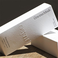 Boîte-cadeau pliante de luxe gaufrage avec logo personnalisé emballage en carton de papier cosmétique à texture spéciale pour bouteilles de parfum boîtes en papier