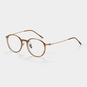 Lunettes de vue rondes Danyang K9010 en titane pur léger pour femmes, verres en plastique, design simple et tendance - Product Image 1