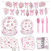 Vaisselle jetable sur le thème de la mer avec nœud rose et coquillages, assiettes en papier, gobelets, serviettes, nappe et bannière pour fête d'anniversaire de filles
