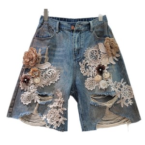 2025 femmes été et automne nouveau Niche dentelle fleur épissage brossé trou taille serrée à la mode Cool Denim Shorts - Product Image 6