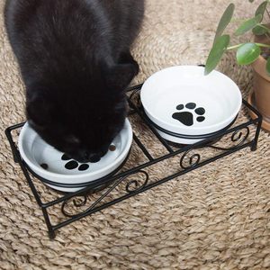 Juego de dos comederos elevados para mascotas con soporte, para agua y comida, con diseño de huellas de patas. - Product Image 1