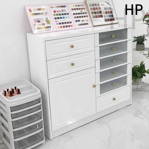 Meuble de salon moderne en bois blanc avec tiroirs de rangement au sol pour vernis à ongles et colle, idéal pour les salons de beauté - Product Image 1