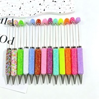 Nouveau stylo rotatif en plastique couleur bonbon entièrement orné de strass, stylo bille DIY en argile et strass, stylo fluorescent 106 très populaire