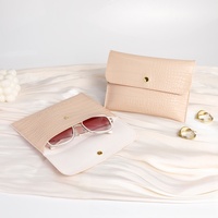 Pochette en cuir PU personnalisée avec logo pour rouge à lèvres, lunettes de soleil, organisateur de bijoux, sac d'emballage avec boutons-pression