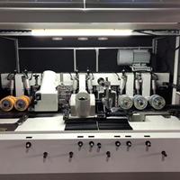 Machine à raboter et à profiler le bois à quatre faces