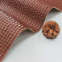 Rouleau de cuir PVC à motif de pierre concave à haute brillance, cuir pour sac à main, matériau de revêtement en cuir