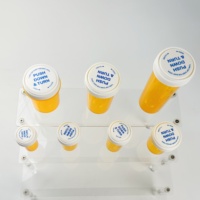 Emballage réversible noir ou bleu Vias Rx utilisé pour l'emballage des flacons de médicaments