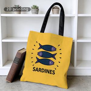 Sac à main à motifs avec une grande capacité. Il présente un motif de poisson sur un fond orange avec du texte sur les sardines et des écailles bleues - Product Image 2