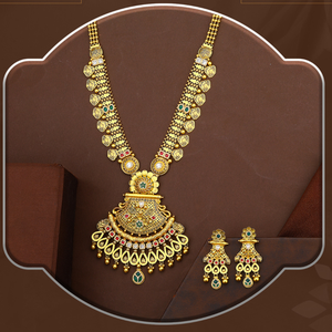 Conjunto de collar largo tradicional de oro con colgante ornamentado y detalles intrincados, ideal para novias, bodas y eventos festivos. - Product Image 1