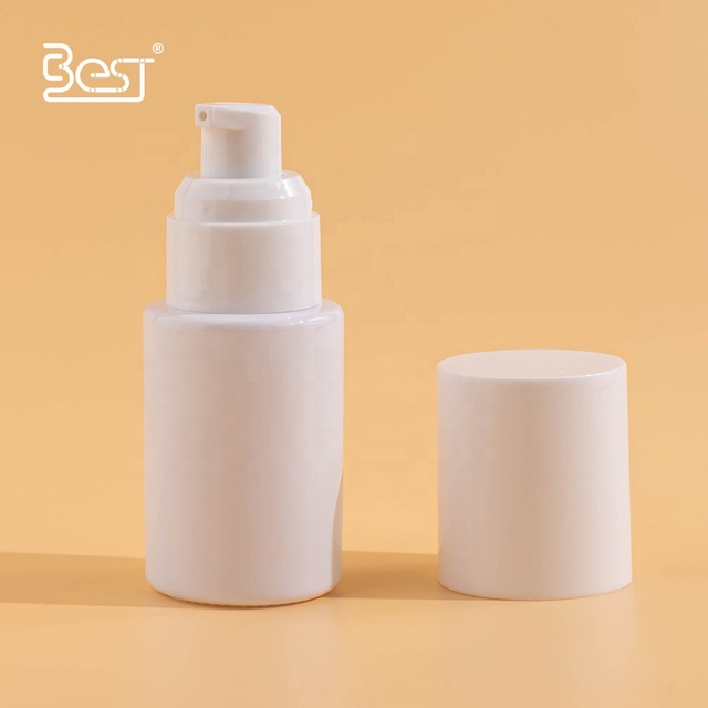 New Design Refillable Cosmetic Container 30ml Face Cream Body Care Essential Serum Lotion Cream White Glass Bottle with Lid Pump